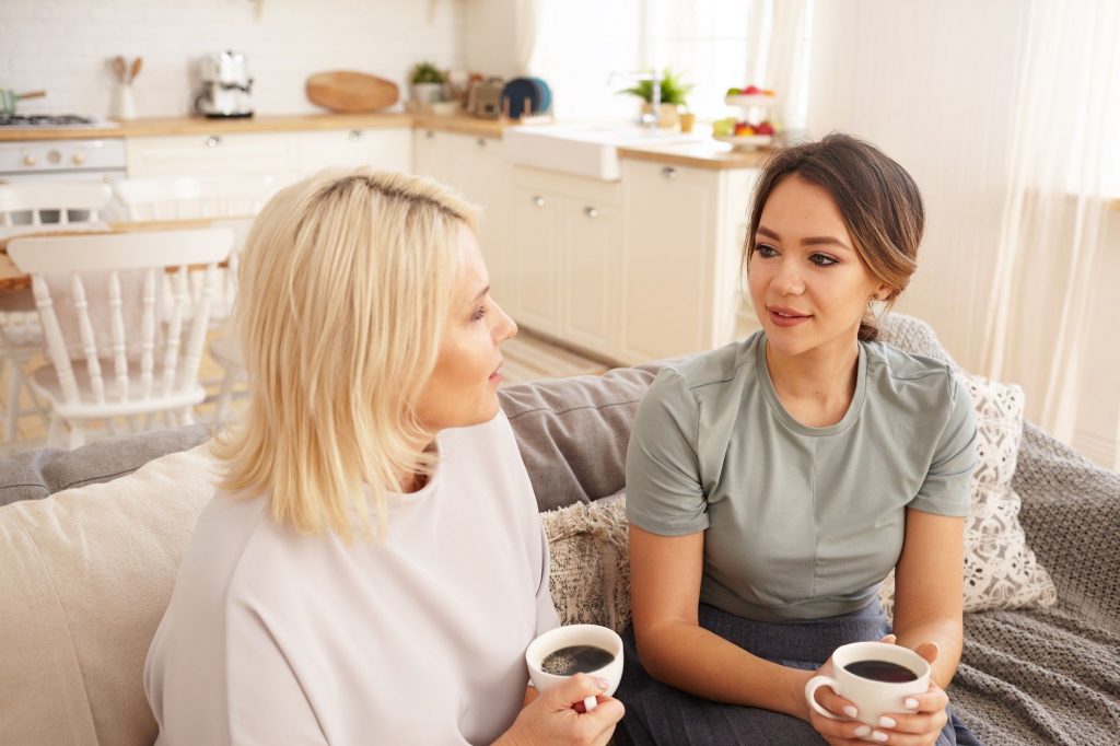 Two parents chatting.